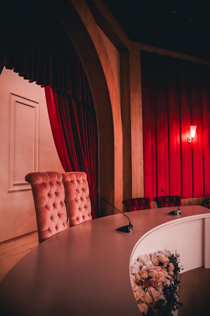 Luxurious event hall with elegant lighting and stage setup